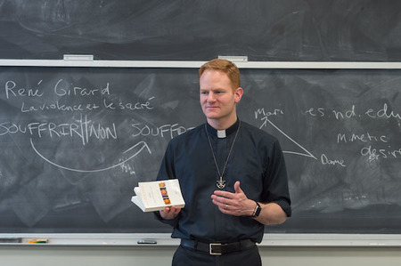 Father Greg Haake teaching